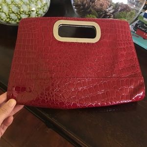Red clutch. Used
